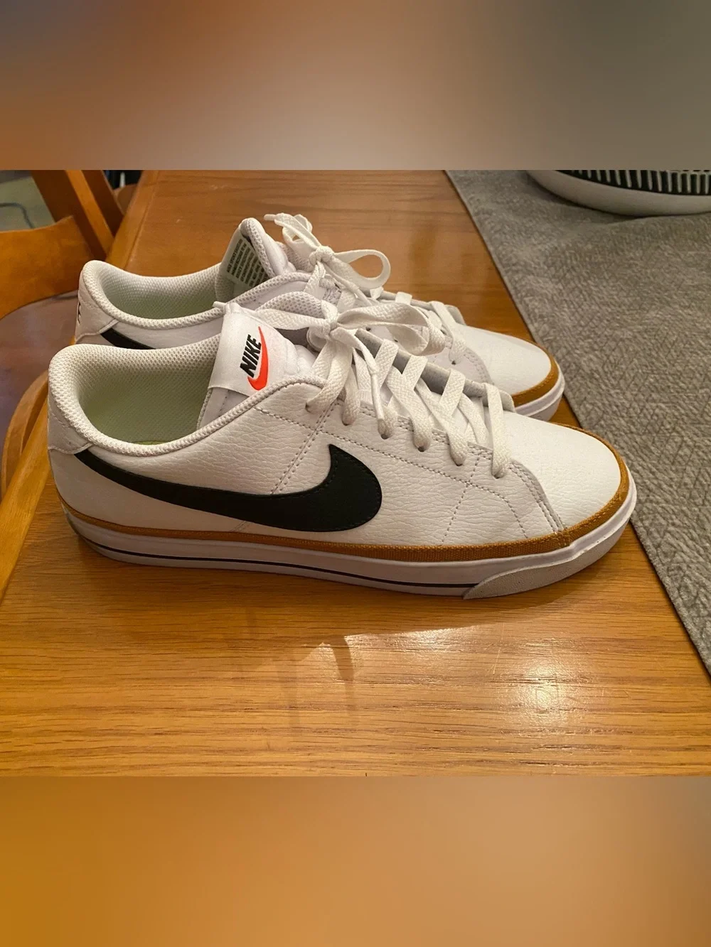 Nike Women’s  White Sneakers with Black Swoosh and Brown Trim